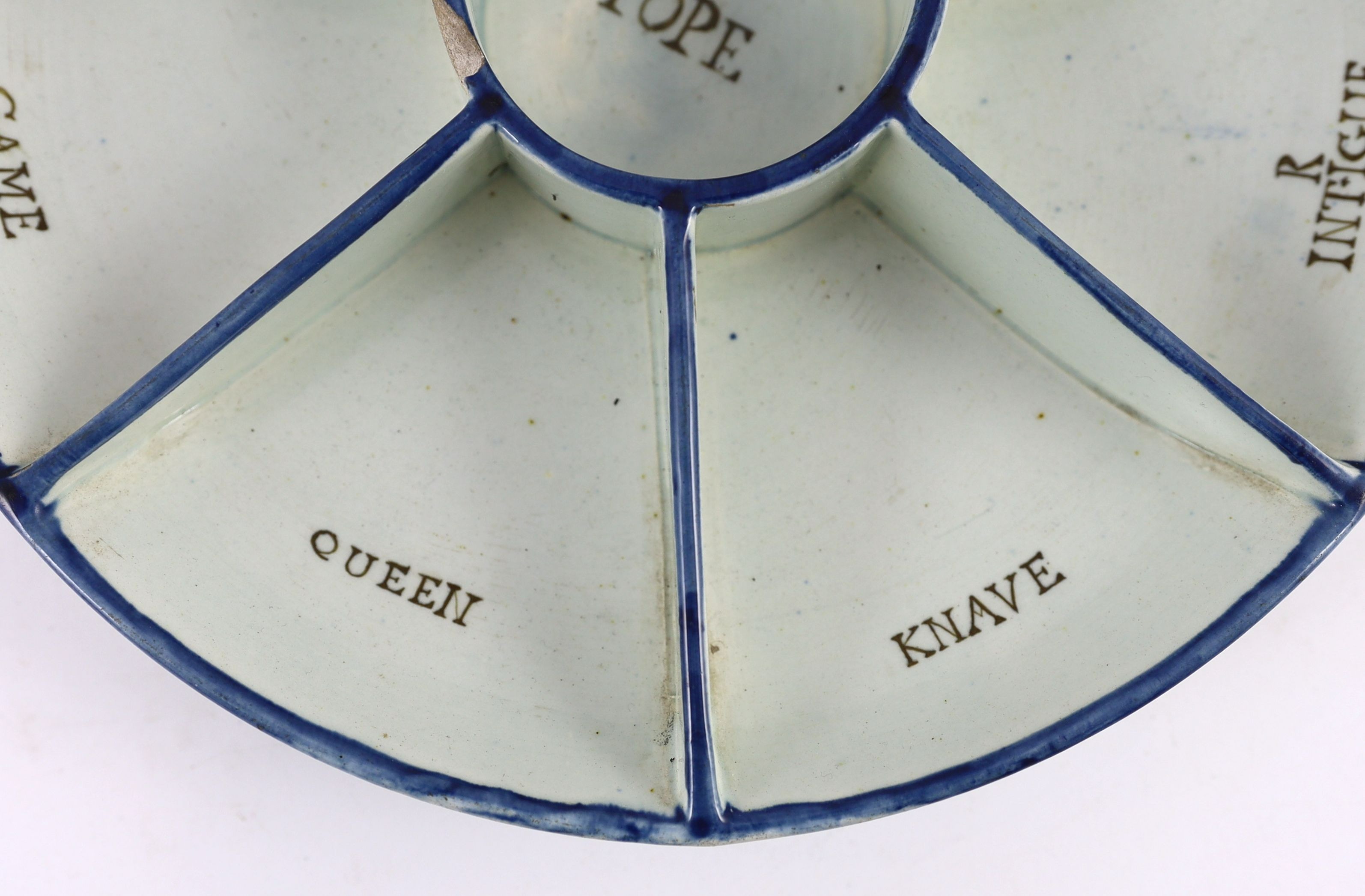 A rare pearlware dish shaped Pope Joan gaming rack, early 19th century, 26.5 cm diameter, small chips